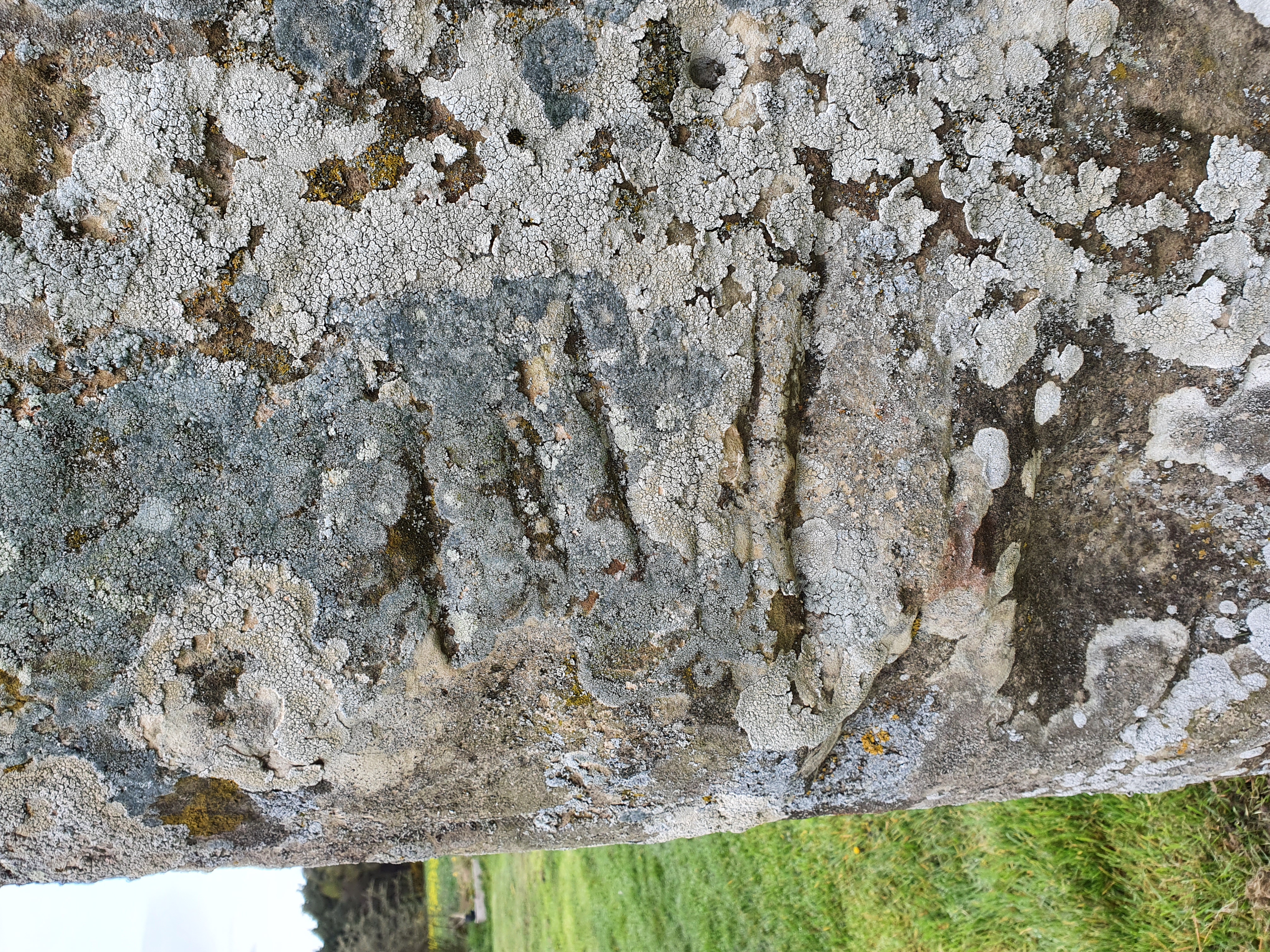 Blade marks on the reverse face of the Kebbuck Stone