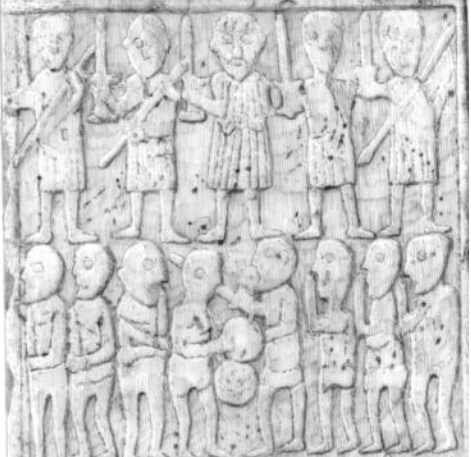 Detail of the carving on the reverse (‘battle’) face of Sueno’s Stone, showing a warband of five warriors, first facing the viewer, then engaged in combat with an enemy.